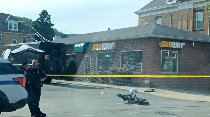 Minor life lighted after being struck on bike by delivery truck