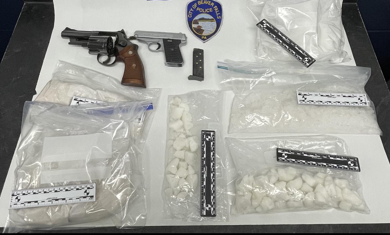 Two people charged and one of them arrested after police seize cash ...